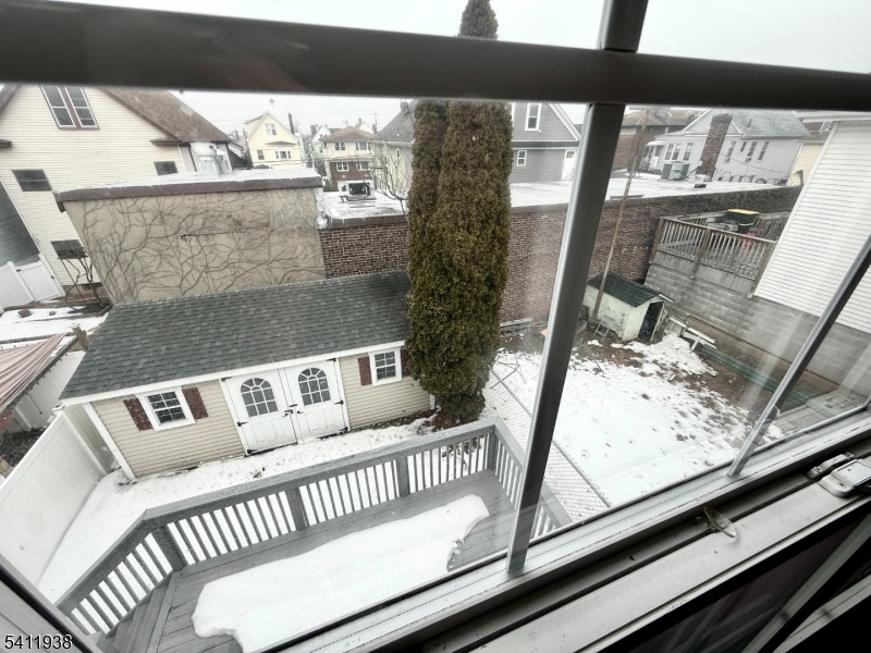 213 Palmer Street, Unit 2 Elizabeth, NJ 07202 - Photo 26 of 28 a view of a balcony with furniture