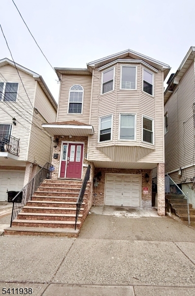 213 Palmer Street, Unit 2 Elizabeth, NJ 07202 - Photo 28 of 28 a front view of a house