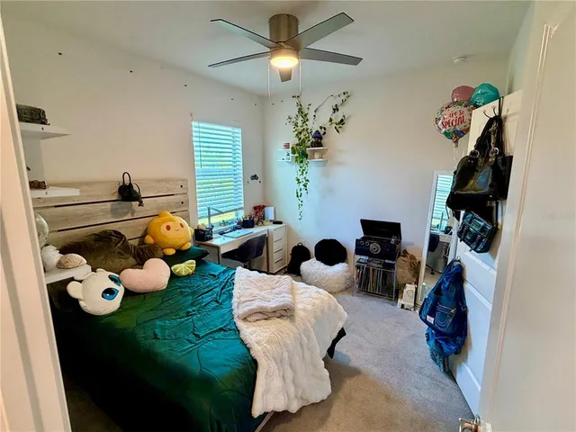 a view of a street with a building in the background