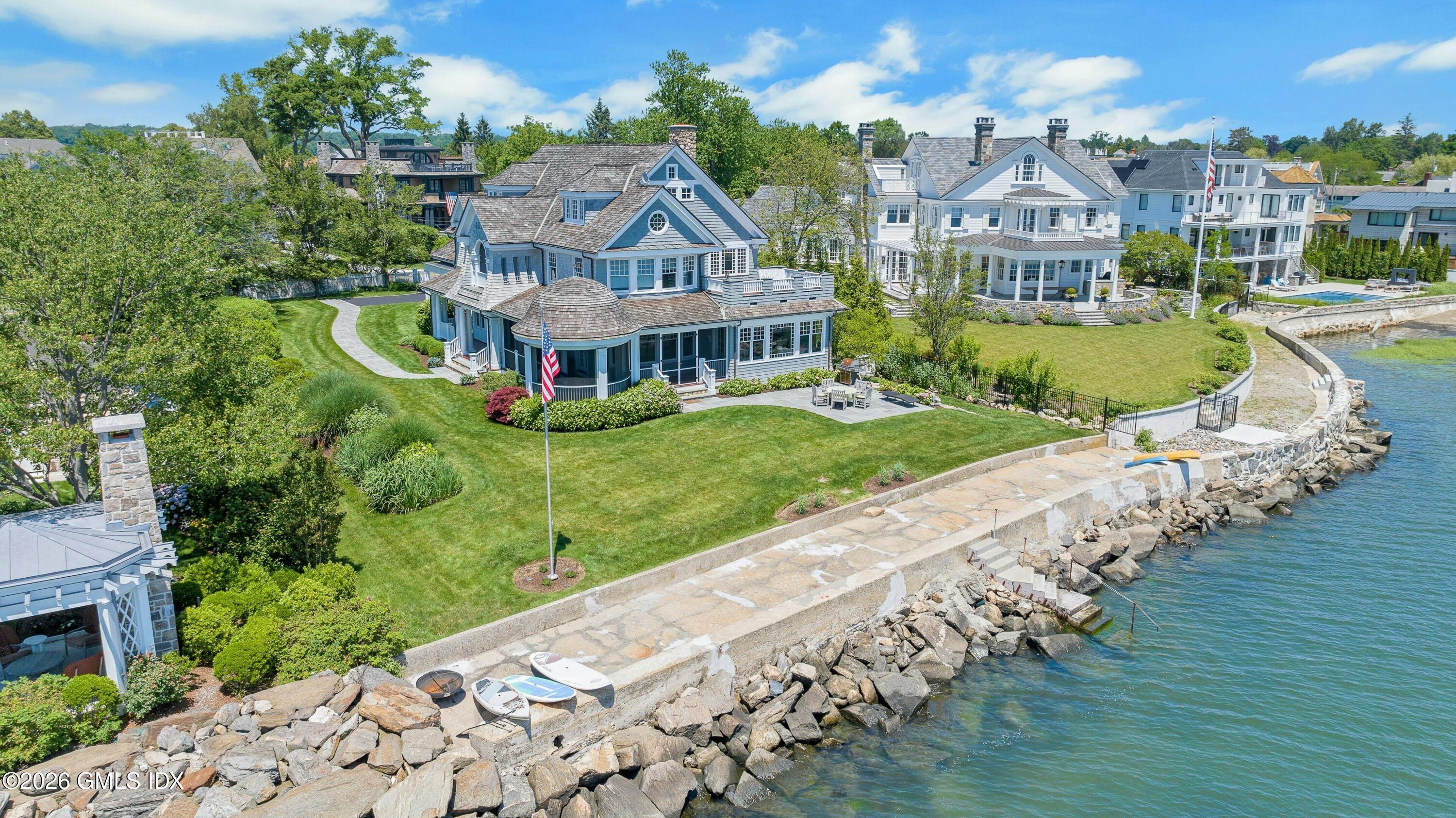 200 Shore Road Old Greenwich, CT 06870 - Photo 31 of 34 a aerial view of a house with a yard