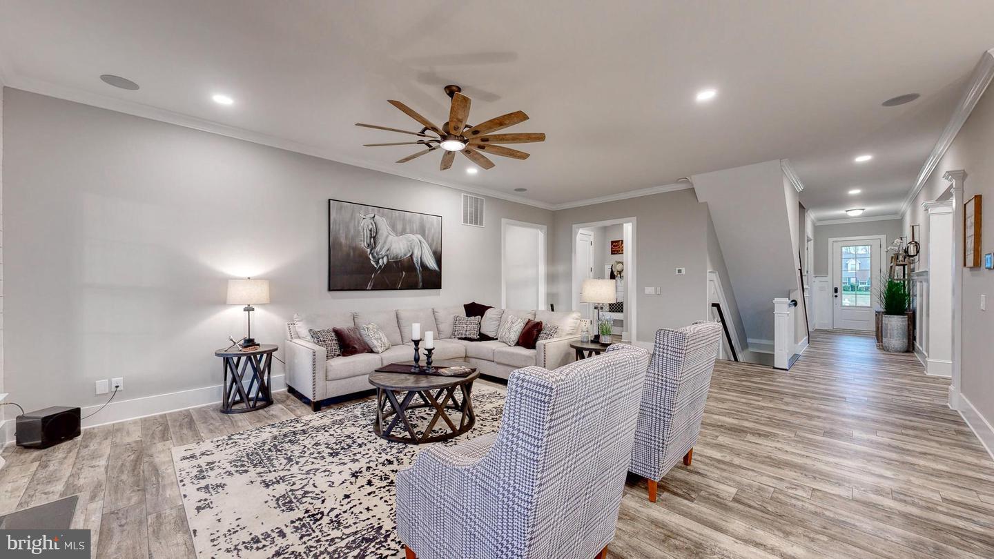 3 William Street Georgetown, DE 19947 - Photo 8 of 25 a living room with furniture and a wooden floor