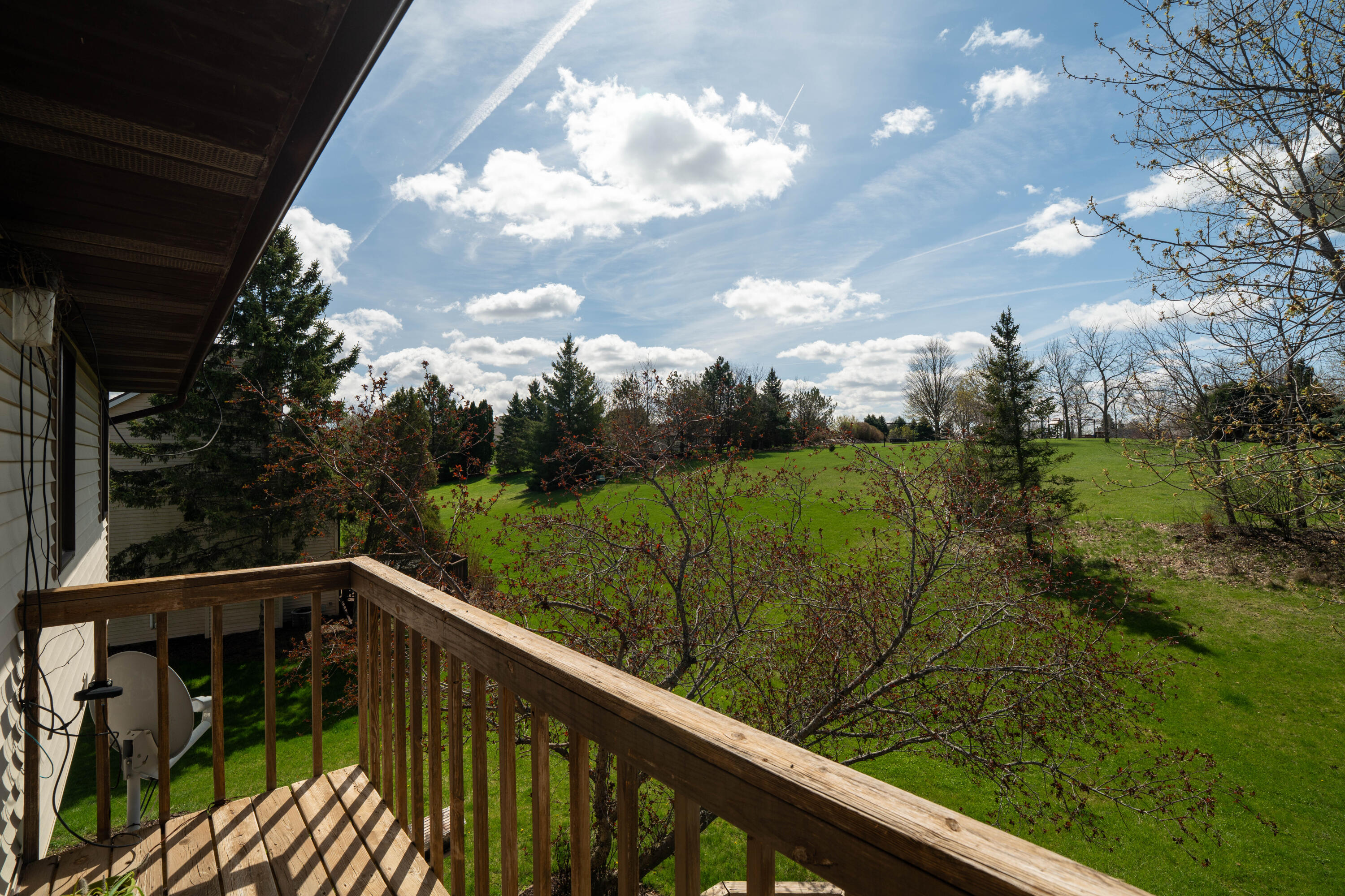 N75W23419 North Ridgeview Circle Sussex, WI 53089 - Photo 54 of 54 Beautiful Skies from the upper deck
