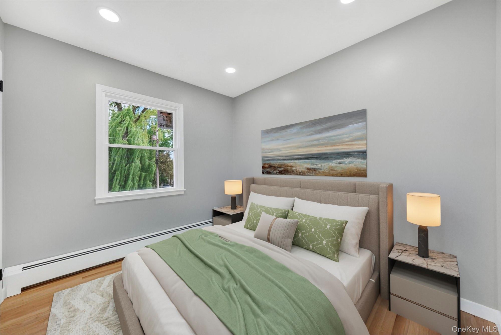 8 Mockingbird Lane Poughkeepsie, NY 12601 - Photo 16 of 32 a bedroom with a bed and a window
