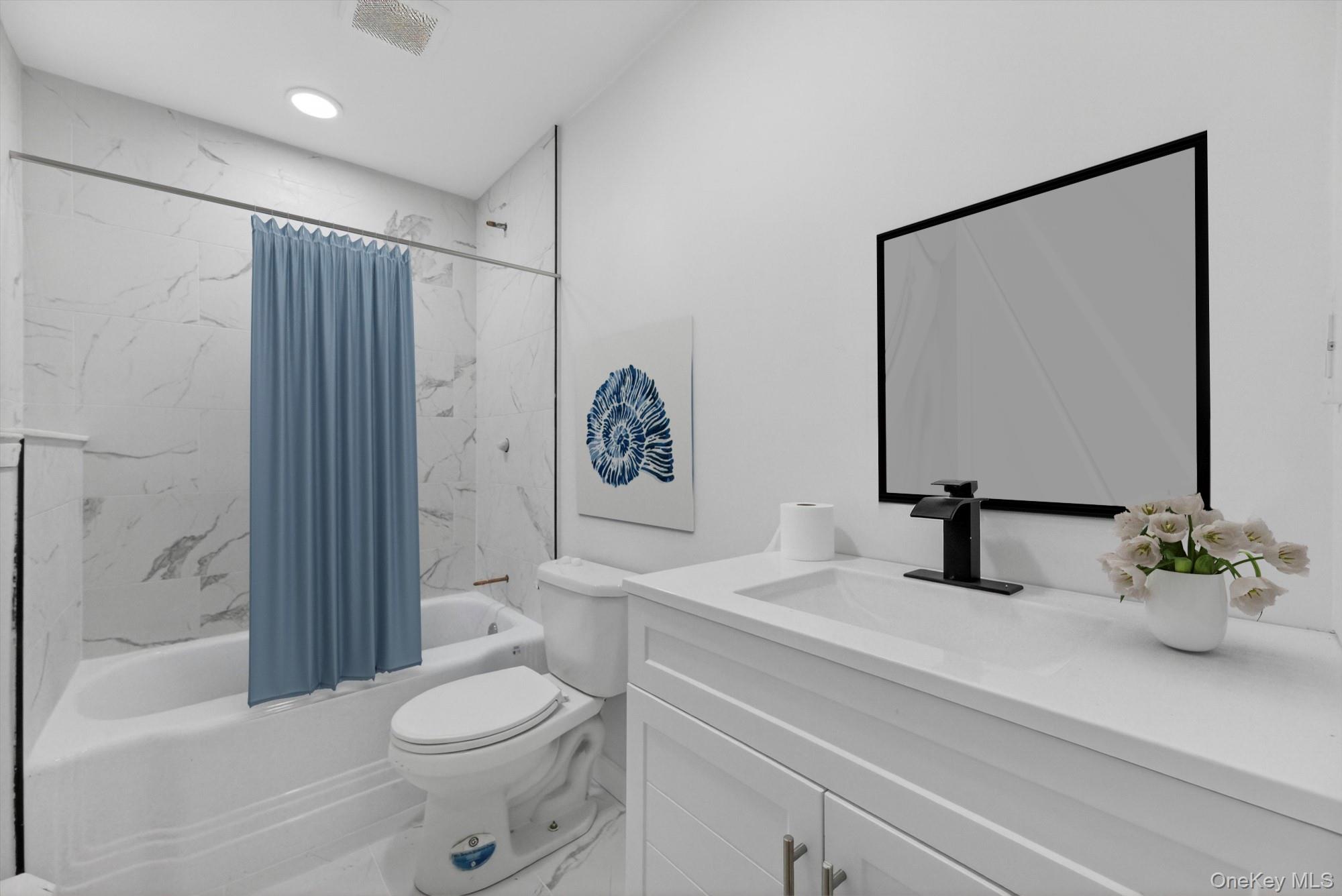 8 Mockingbird Lane Poughkeepsie, NY 12601 - Photo 17 of 32 a bathroom with a sink a toilet and shower
