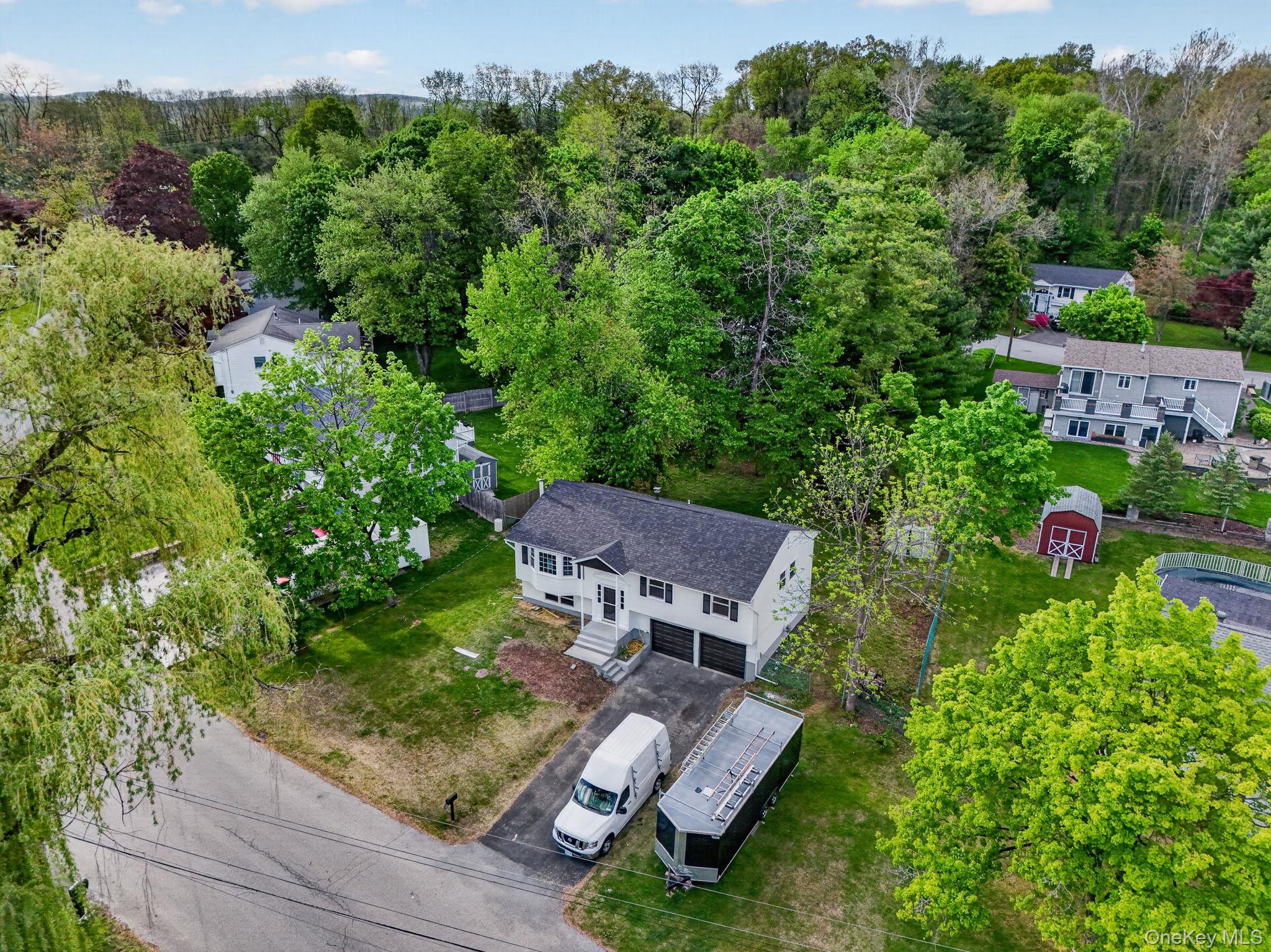 8 Mockingbird Lane Poughkeepsie, NY 12601 - Photo 27 of 32 an aerial view of a house with garden space and street view