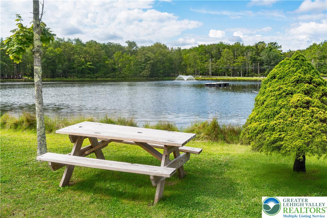 804 Evergreen Road Tobyhanna, PA 18466 - Photo 9 of 19 a view of a lake with outdoor seating
