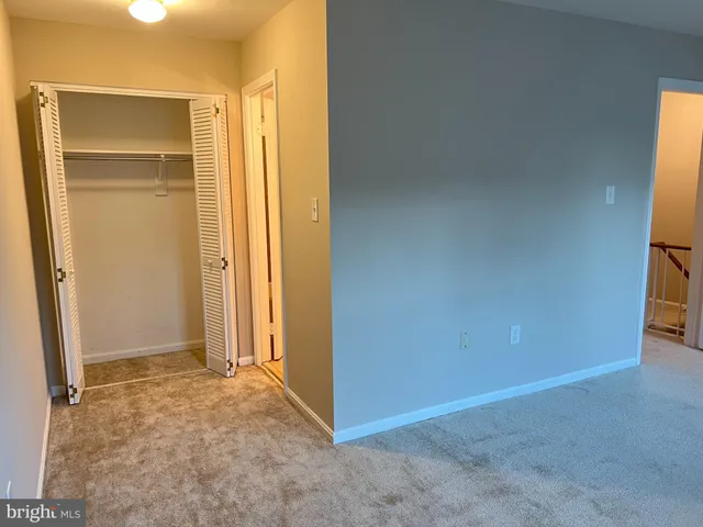 an empty room with closet