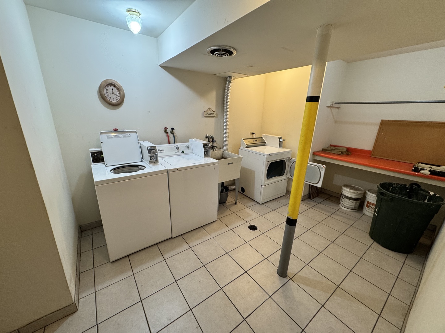 5500 West 127th Street, Unit 4 Alsip, IL 60803 - Photo 14 of 15 a view of a kitchen with fridge and furniture