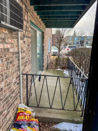 a view of entryway with a table and chairs