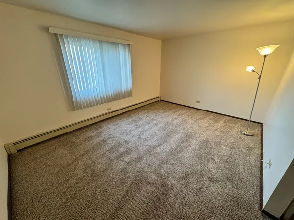 a view of an empty room with entrance