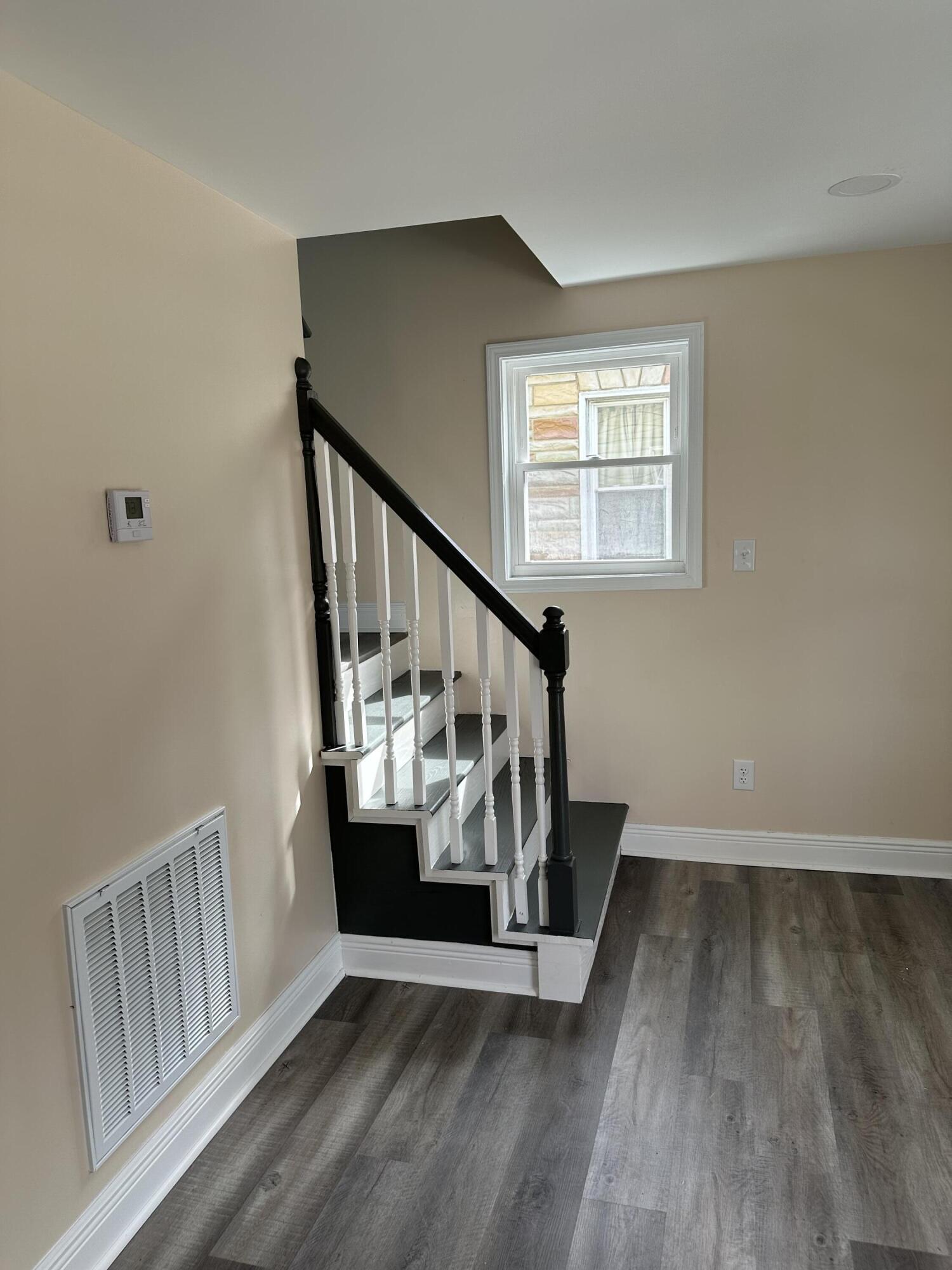 707 Rutherford Avenue Northwest Roanoke, VA 24016 - Photo 16 of 22 a view of entryway with wooden floor
