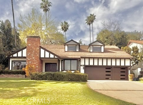 a view of a house with a swimming pool