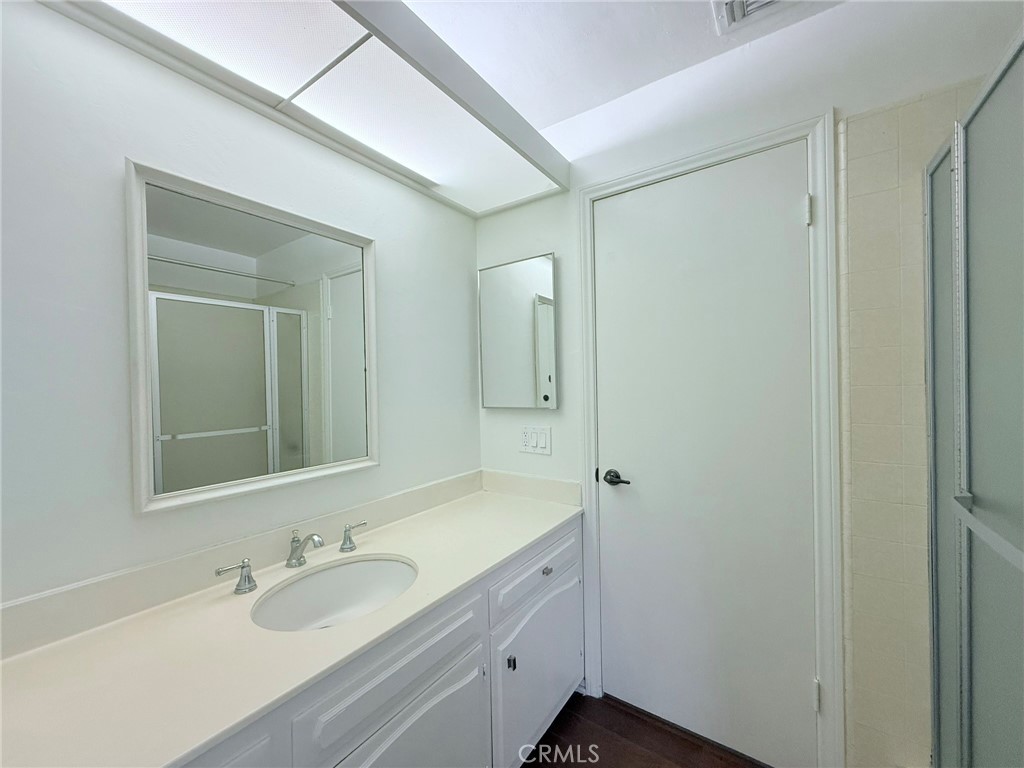 1727 Euston Road San Marino, CA 91108 - Photo 15 of 36 a bathroom with a granite countertop sink mirror and double