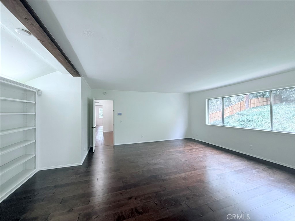 1727 Euston Road San Marino, CA 91108 - Photo 19 of 36 an empty room with wooden floor and windows