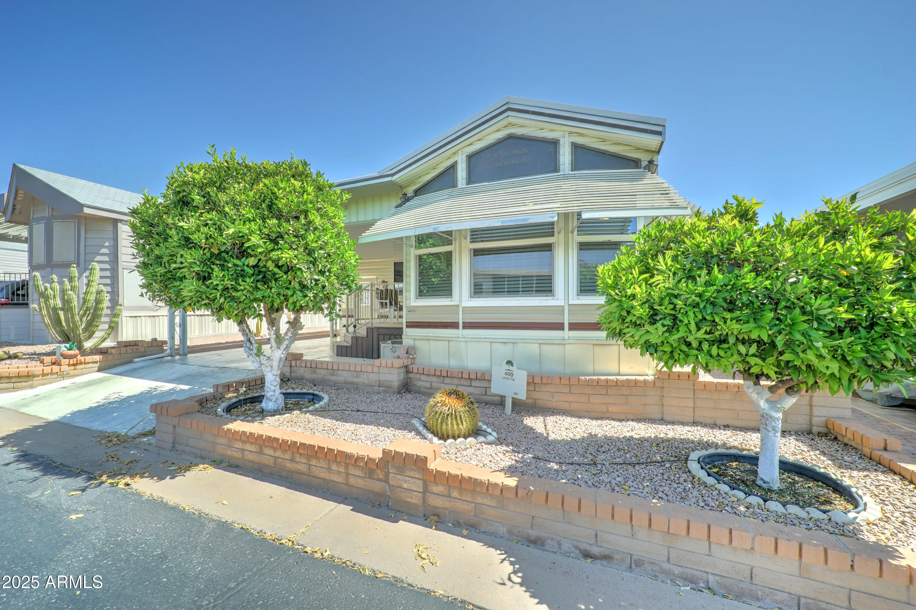111 South Greenfield Road, Unit 400 Mesa, AZ 85206 - Photo 17 of 32 Front_Orange trees