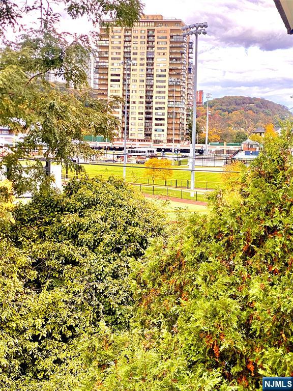 1111 River Road, Unit H21 Edgewater, NJ 07020 - Photo 3 of 8 a view of an ocean