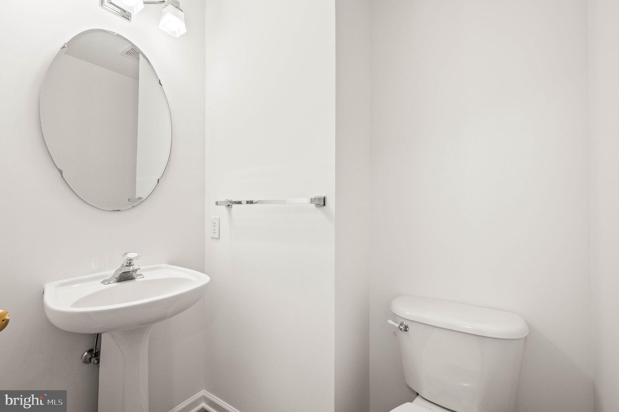 420 Winding Stream Road Spring City, PA 19475 - Photo 8 of 45 a bathroom with a sink toilet and a mirror