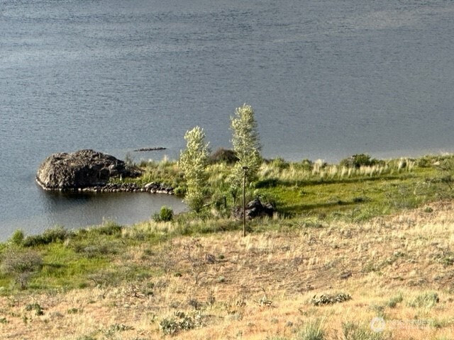 0 South Harrison Road West Spokane, WA 99224 - Photo 15 of 15 a view of a lake with lawn chairs