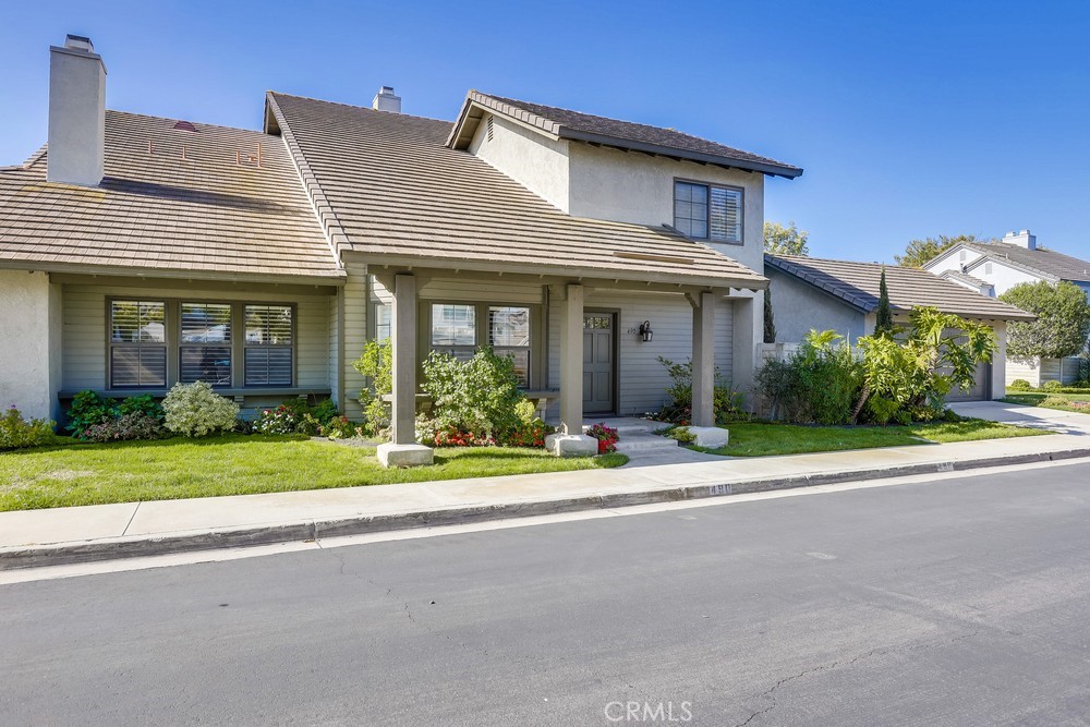490 East Yale Loop Irvine, CA 92614 - Photo 1 of 1 front view of a house with a yard