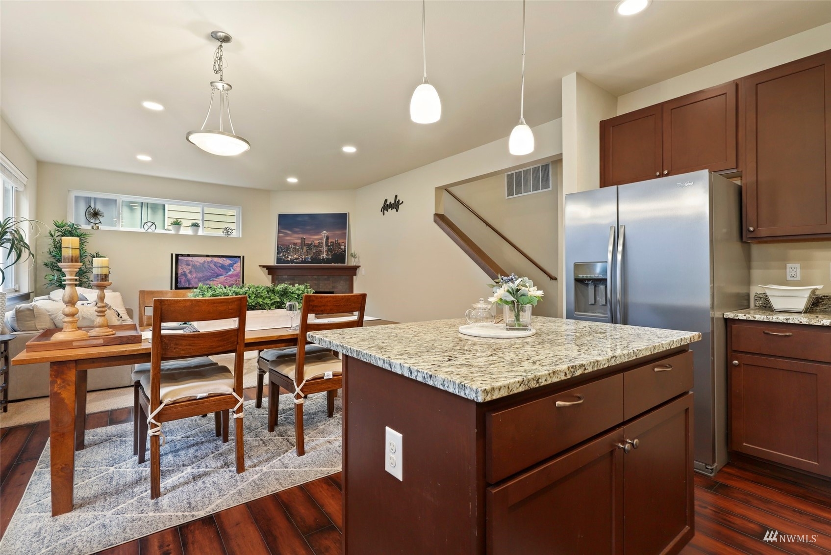 20220 3rd Drive Southeast Bothell, WA 98012 - Photo 18 of 37 a kitchen with stainless steel appliances granite countertop a kitchen island a stove and a refrigerator