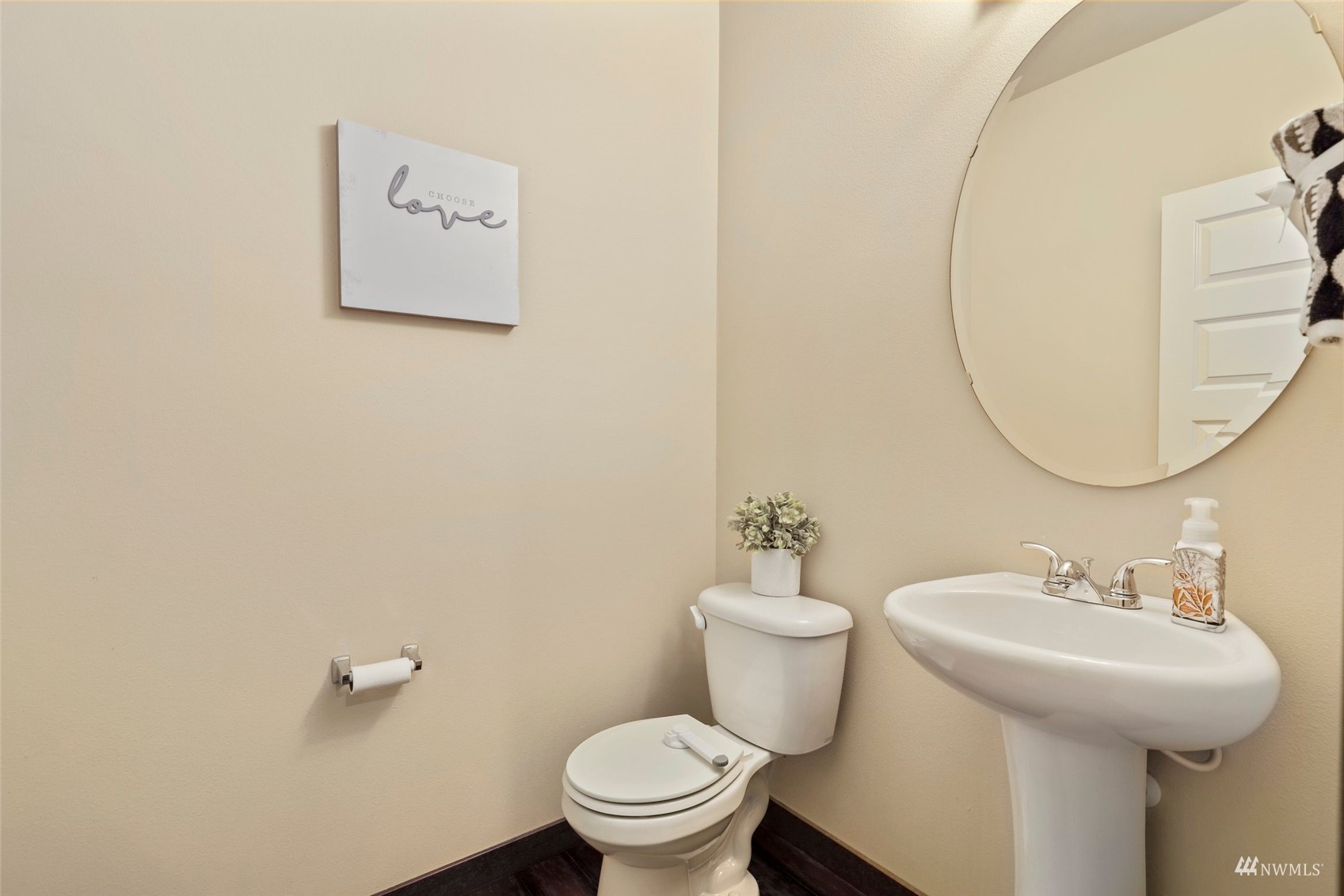 20220 3rd Drive Southeast Bothell, WA 98012 - Photo 19 of 37 a bathroom with a toilet sink and mirror