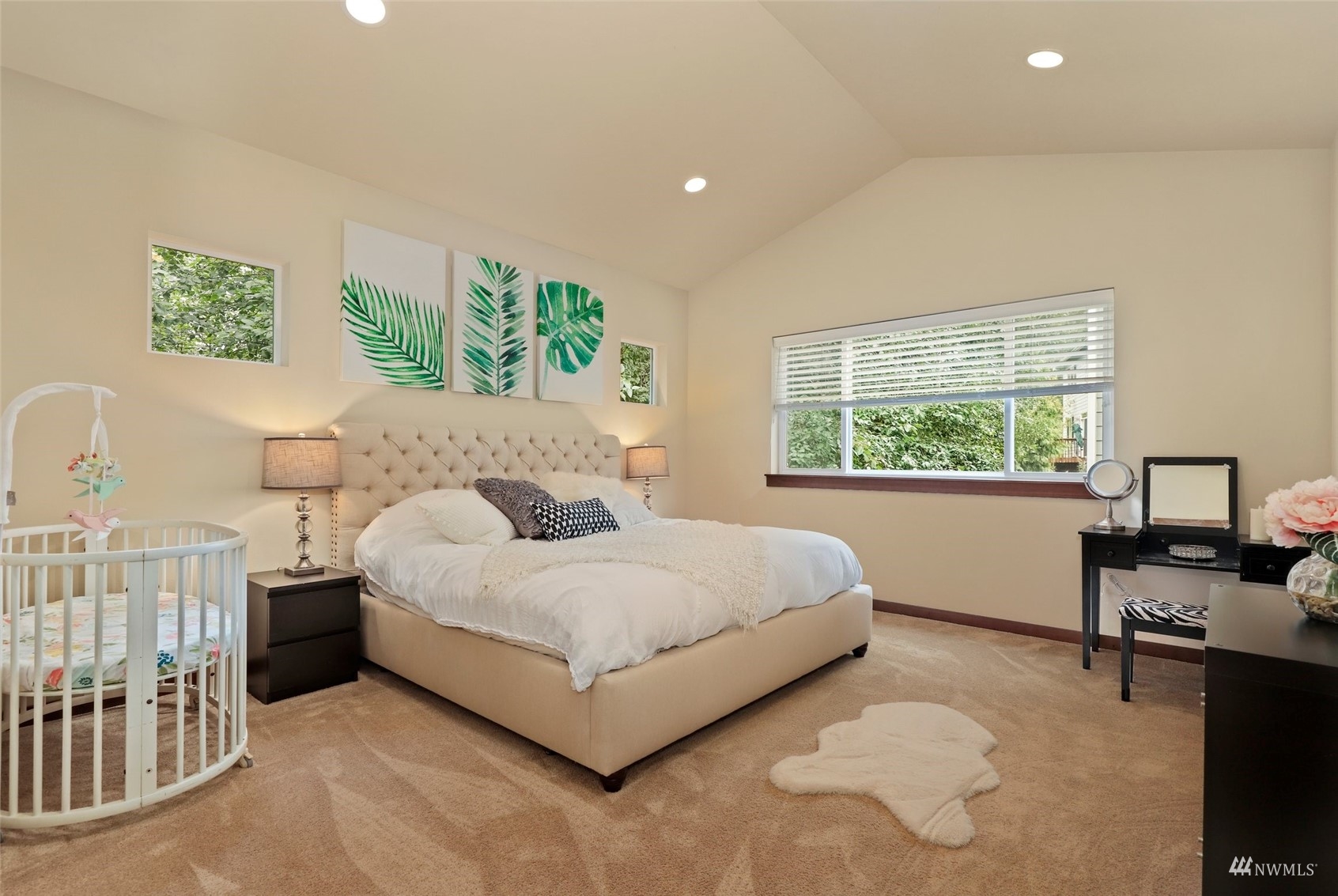 20220 3rd Drive Southeast Bothell, WA 98012 - Photo 20 of 37 a spacious bedroom with a bed and a table in it