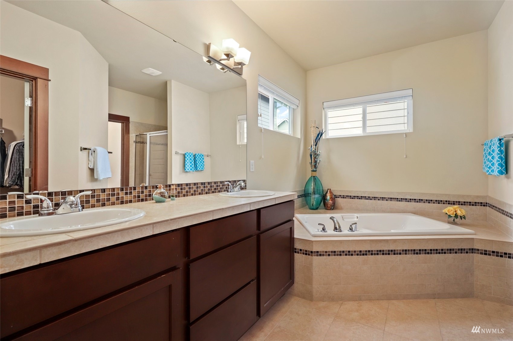 20220 3rd Drive Southeast Bothell, WA 98012 - Photo 22 of 37 a bathroom with a sink and a mirror