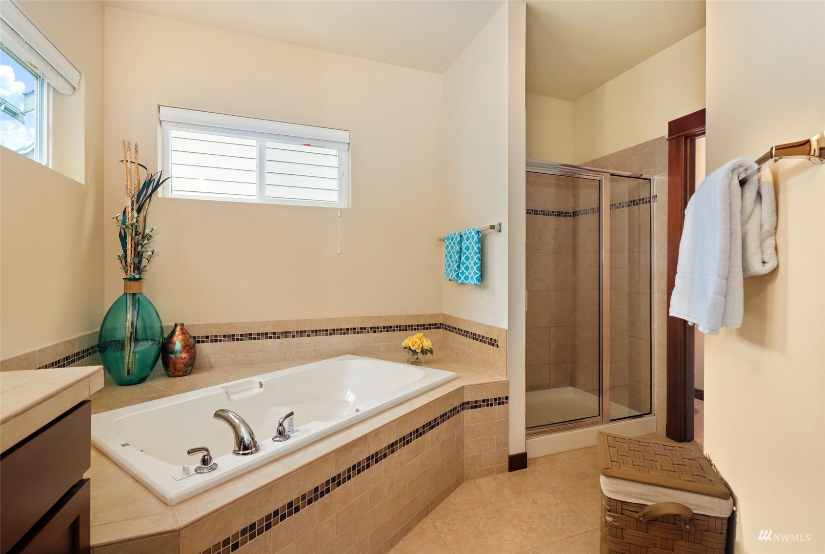 20220 3rd Drive Southeast Bothell, WA 98012 - Photo 23 of 37 a bathroom with a tub a sink and a window