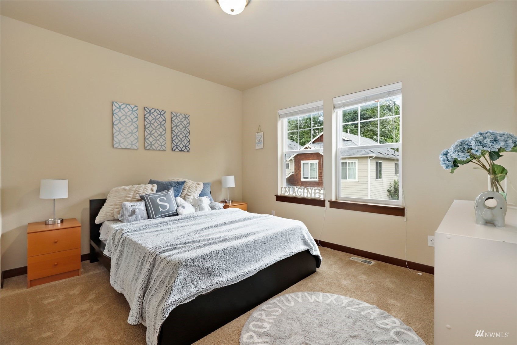 20220 3rd Drive Southeast Bothell, WA 98012 - Photo 25 of 37 a bedroom with a large bed and a window