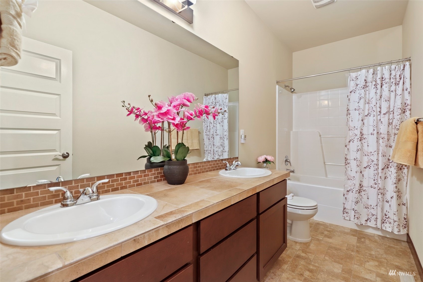 20220 3rd Drive Southeast Bothell, WA 98012 - Photo 28 of 37 a bathroom with a double vanity sink mirror and toilet
