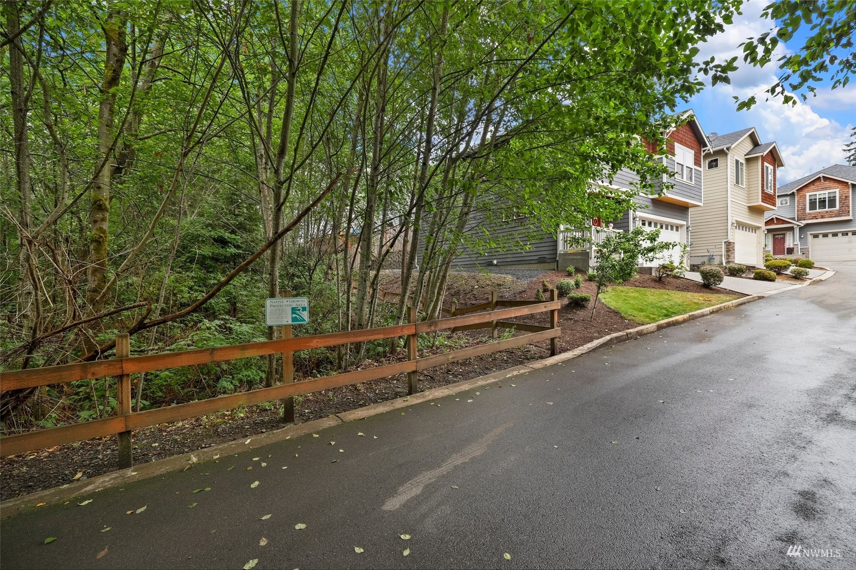 20220 3rd Drive Southeast Bothell, WA 98012 - Photo 3 of 37 a view of a street with houses on both side