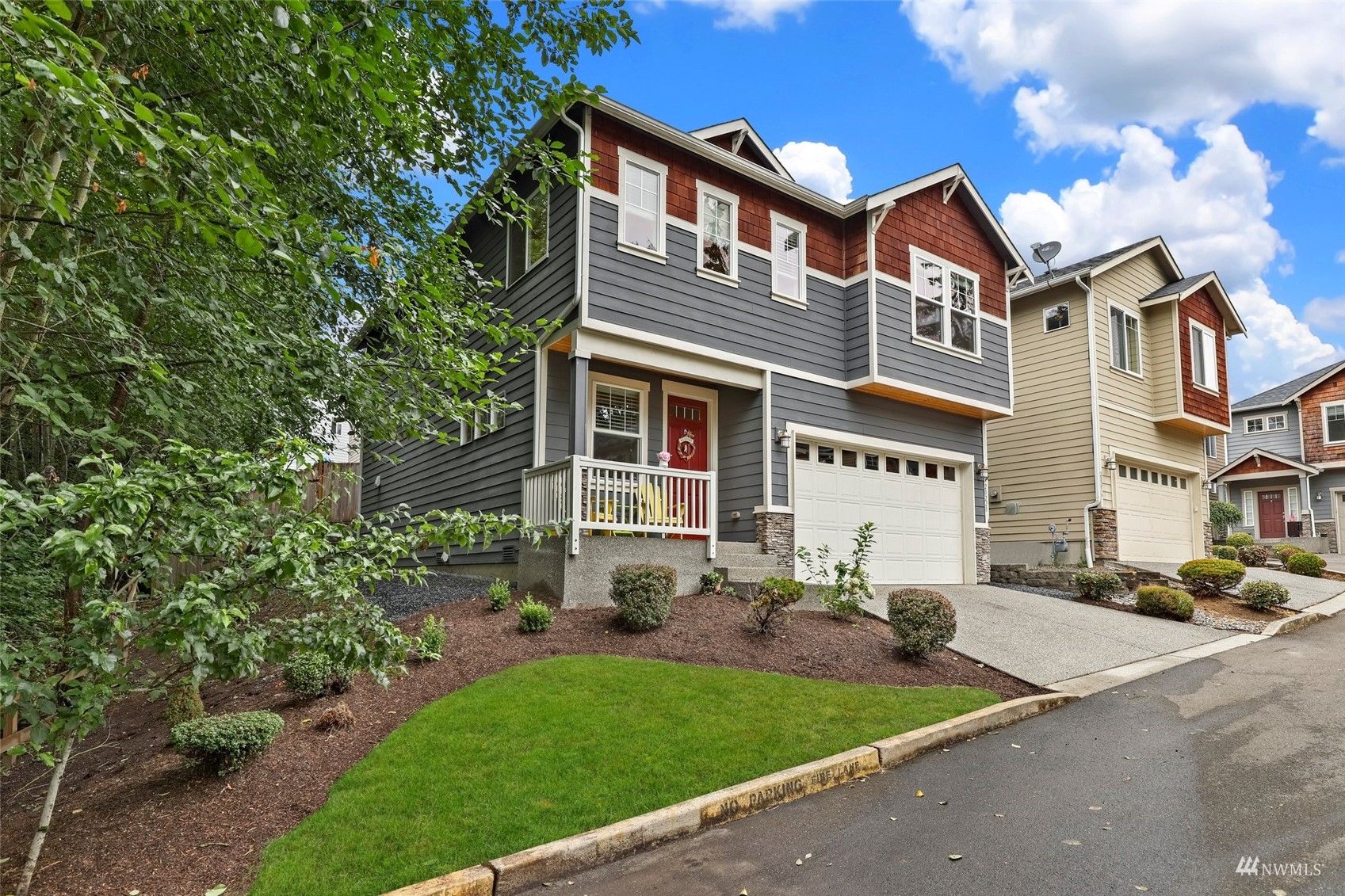 20220 3rd Drive Southeast Bothell, WA 98012 - Photo 36 of 37 a front view of a house with a yard