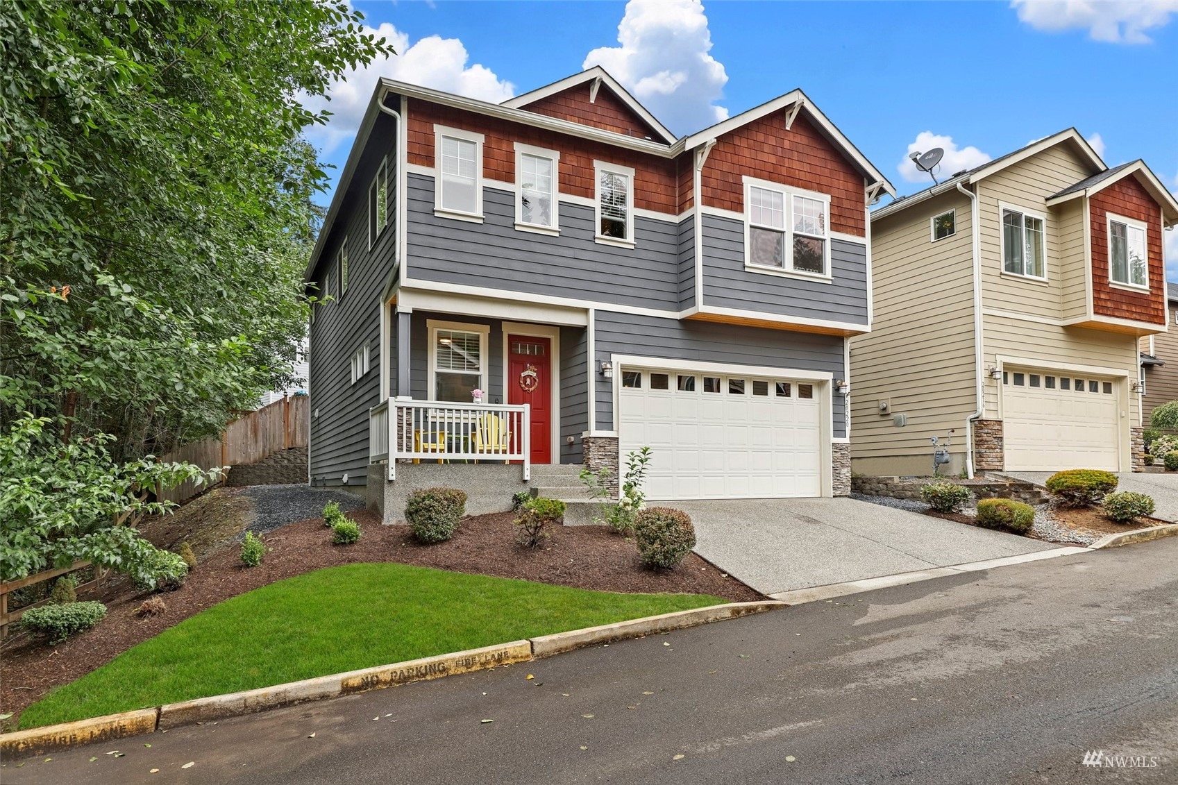 20220 3rd Drive Southeast Bothell, WA 98012 - Photo 4 of 37 a front view of a house with a yard and garage