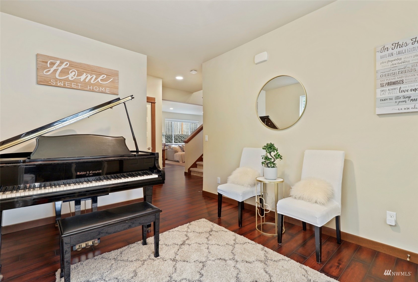 20220 3rd Drive Southeast Bothell, WA 98012 - Photo 8 of 37 a living room with furniture a rug and a wooden floor