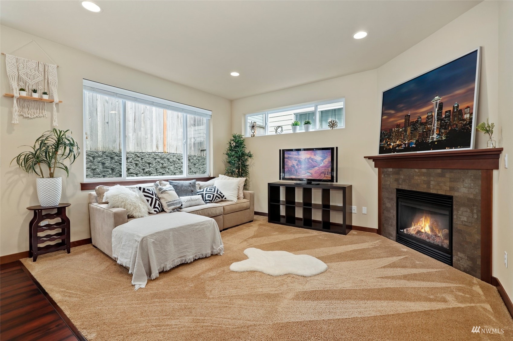 20220 3rd Drive Southeast Bothell, WA 98012 - Photo 10 of 37 a spacious bedroom with a large bed and a fireplace