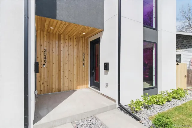 a view of a bathroom from a hallway