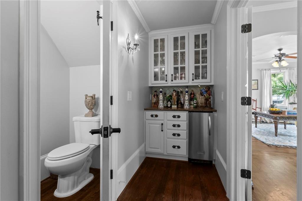 285 Old Hornage Road Ball Ground, GA 30107 - Photo 28 of 64 a bathroom with a toilet a sink a shower and a mirror