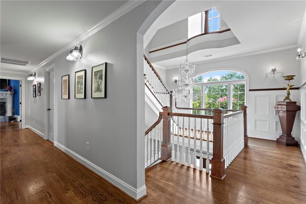285 Old Hornage Road Ball Ground, GA 30107 - Photo 30 of 64 a view of entryway with stairs and wooden floor