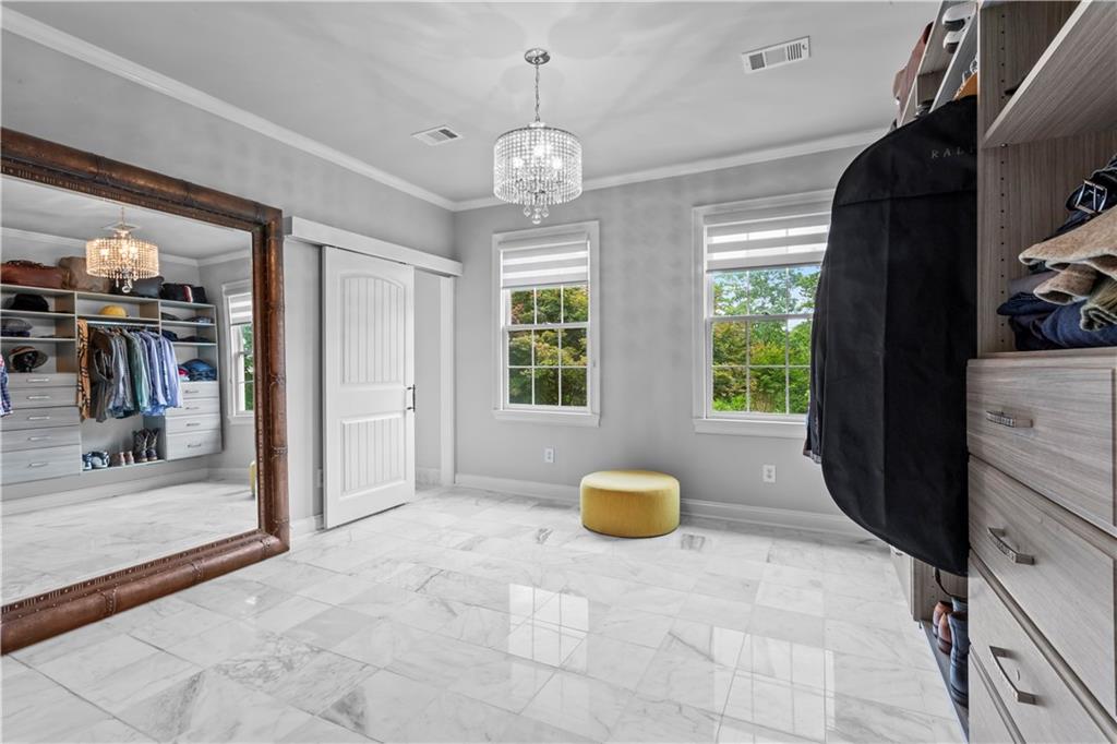 285 Old Hornage Road Ball Ground, GA 30107 - Photo 35 of 64 a view of an entryway with a chandelier