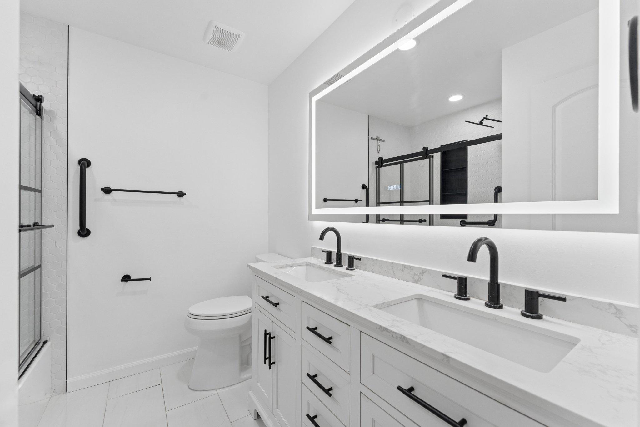 3219 Fox Mill Road Oakton, VA 22124 - Photo 40 of 87 Sleek modern upstairs hall bathroom with elegance