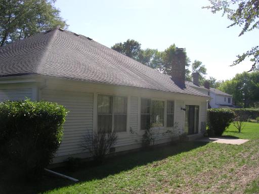 837 West Bauer Road Naperville, IL 60563 - Photo 14 of 16 a front view of a house with garden
