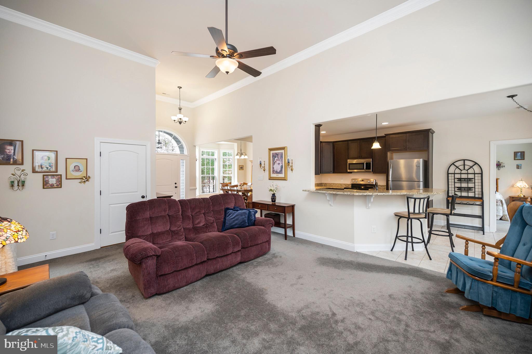 23145 Walker's Branch Road Unionville, VA 22567 - Photo 11 of 48 a living room with furniture and a flat screen tv