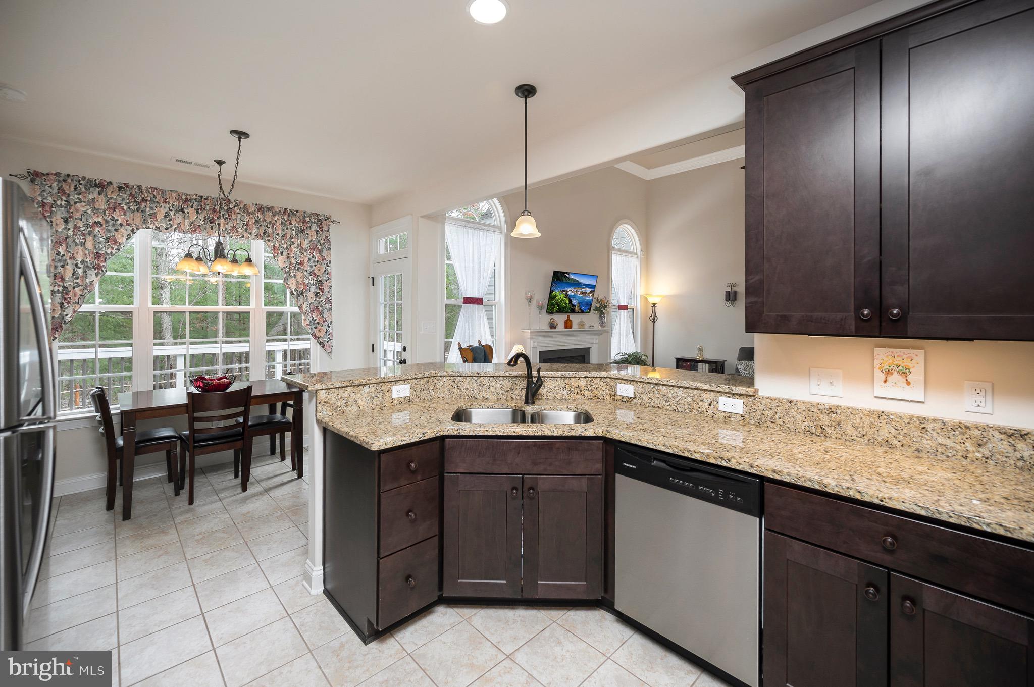 23145 Walker's Branch Road Unionville, VA 22567 - Photo 14 of 48 a kitchen with a sink and cabinets