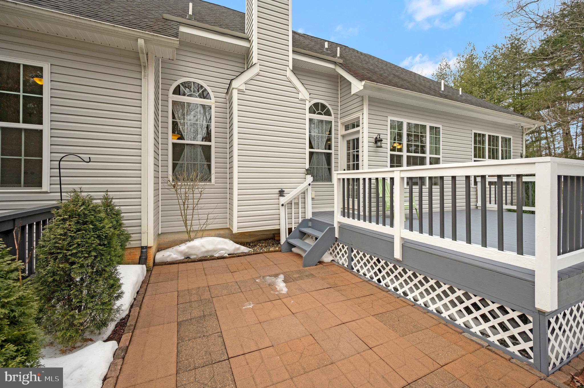 23145 Walker's Branch Road Unionville, VA 22567 - Photo 22 of 48 a back view of a house with wooden fence