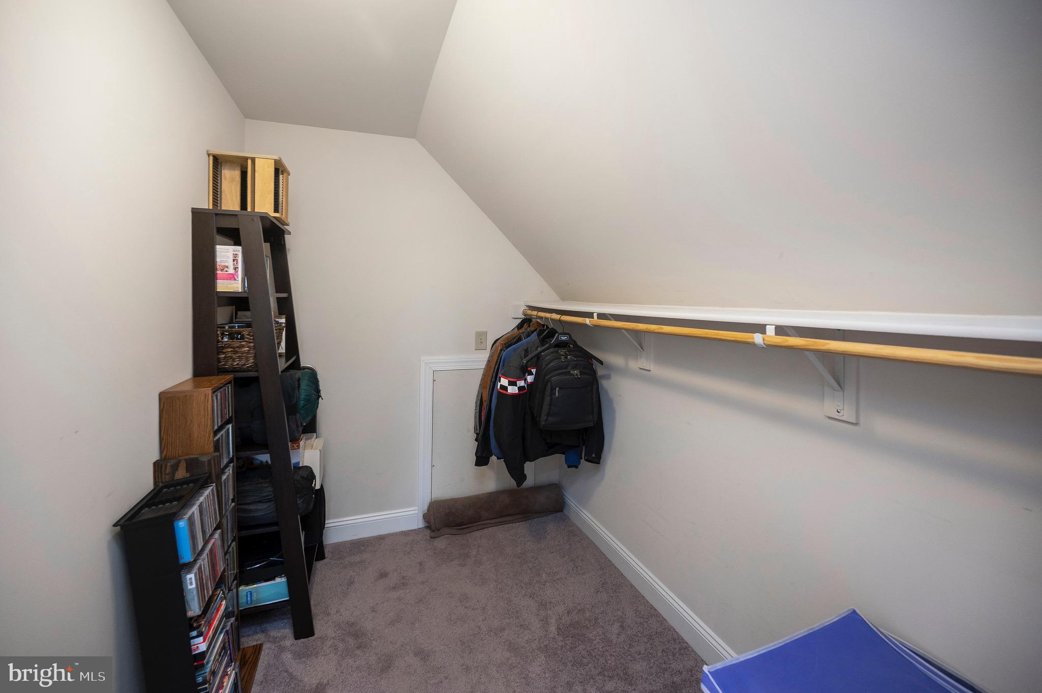 23145 Walker's Branch Road Unionville, VA 22567 - Photo 35 of 48 a view of walk in closet with clothes and shoes