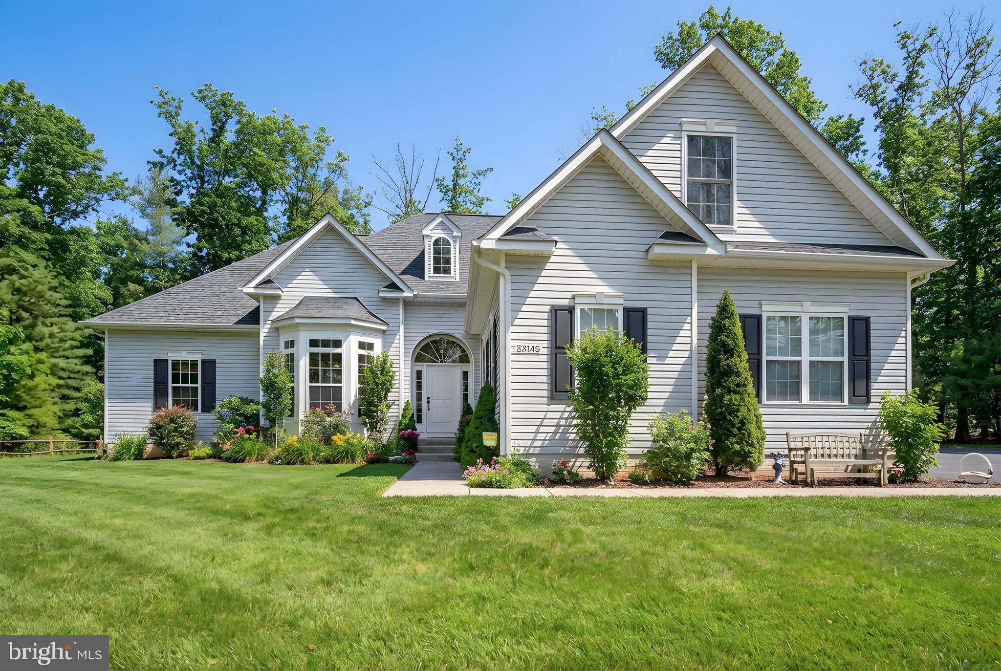 23145 Walker's Branch Road Unionville, VA 22567 - Photo 43 of 48 a front view of house with a garden