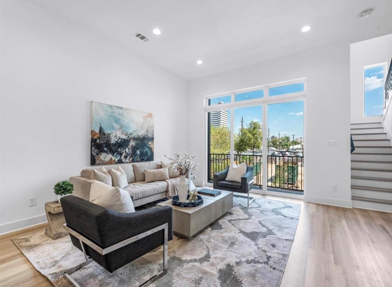 5910 Val Verde Street Houston, TX 77057 - Photo 16 of 21 a living room with furniture and a large window