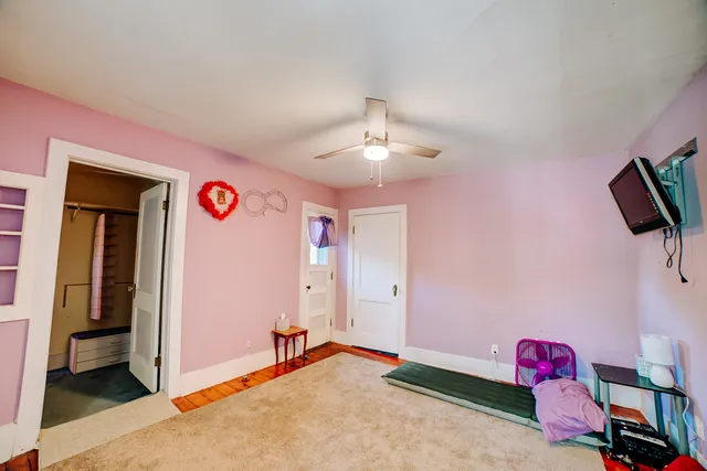 a bathroom with a shower and a sink