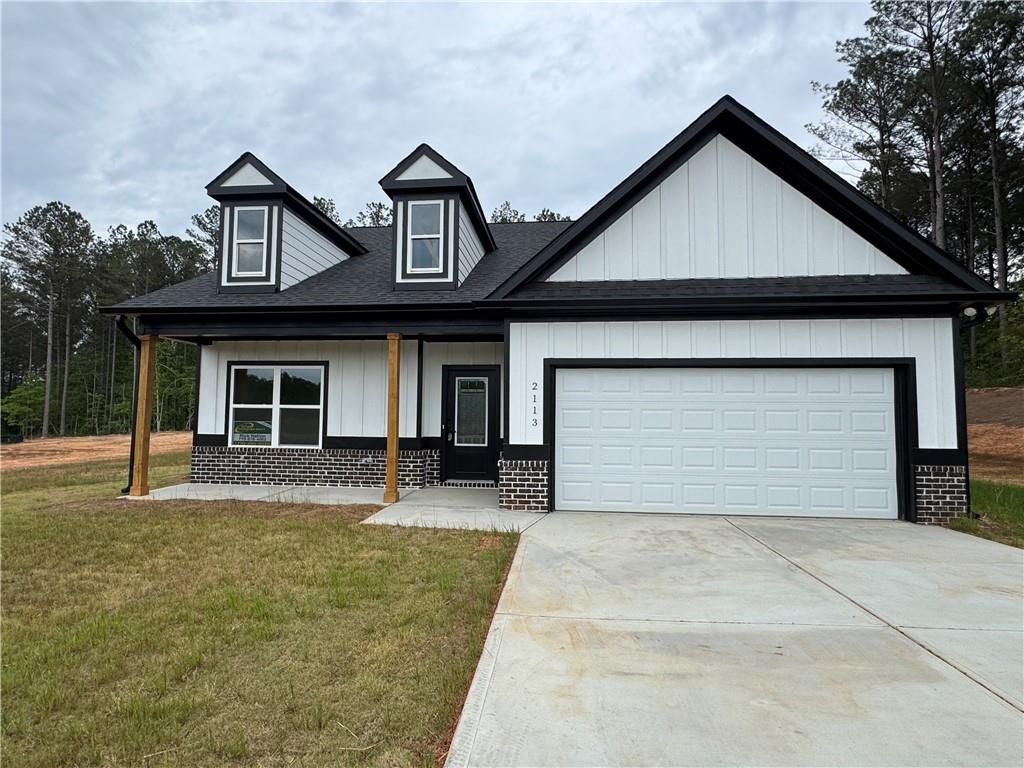 front view of a house with yard