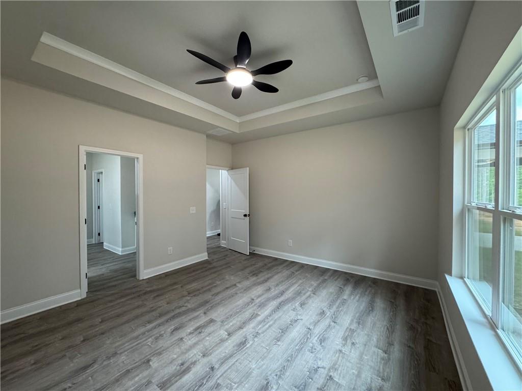 2113 North Hicks Road Toccoa, GA 30577 - Photo 11 of 28 wooden floor in an empty room with a window